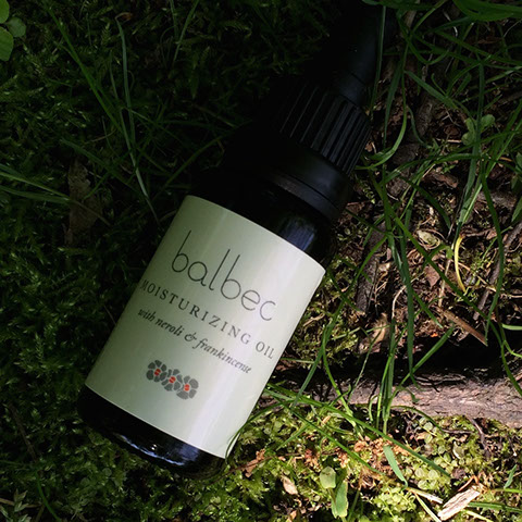 Moisturizing Oil with neroli and frankincense, nestled in the wild